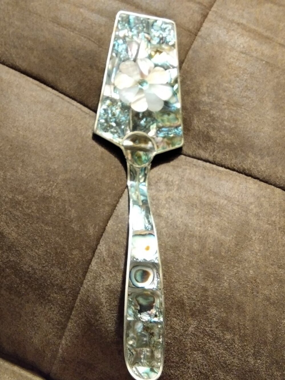 Vintage abalone kitchen spatula.